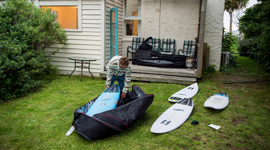 How To Travel With a Surfboard Packing Tips