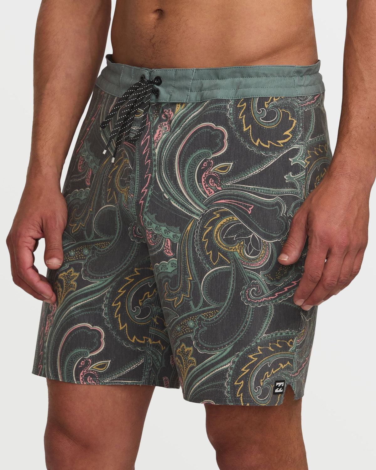 Dark slate boardshorts with colorful paisley and scroll pattern, drawstring waist, 18" inseam.