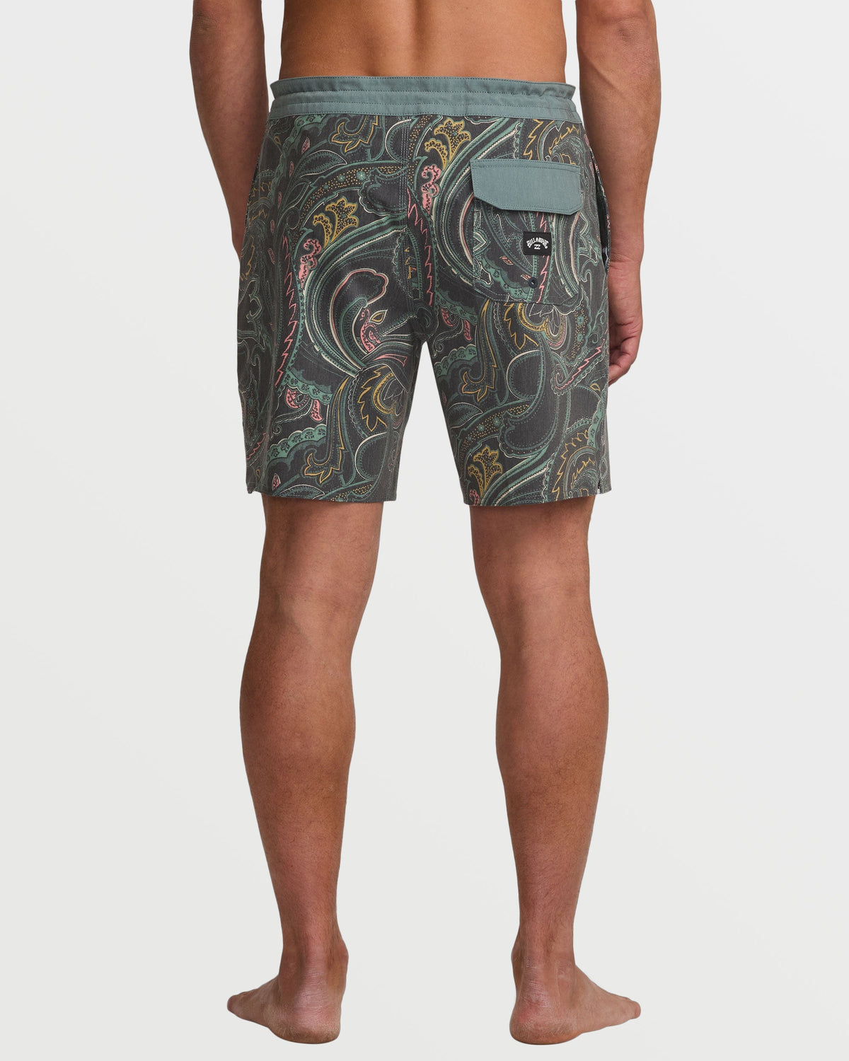 Dark slate boardshorts with ornate gold, green, and burgundy paisley pattern, back pocket, and solid waistband.