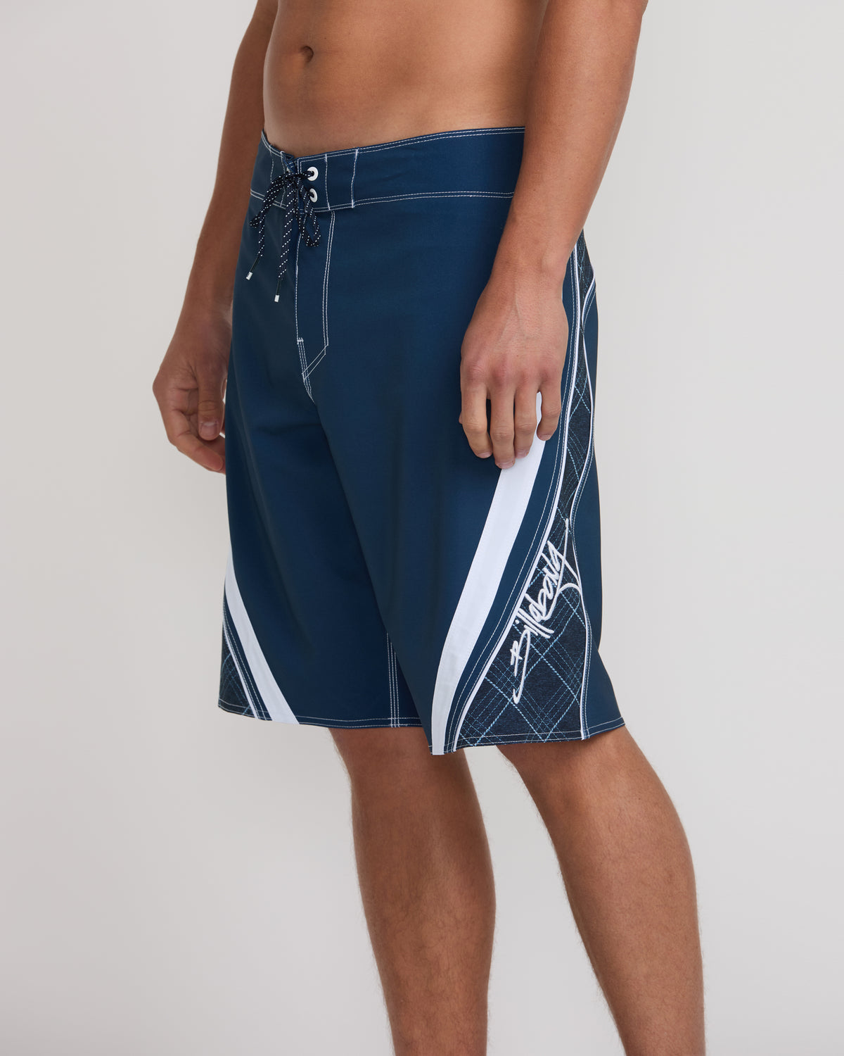 Midnight blue boardshorts with white side stripe and contrasting stitch detail, drawstring waist, knee-length cut.