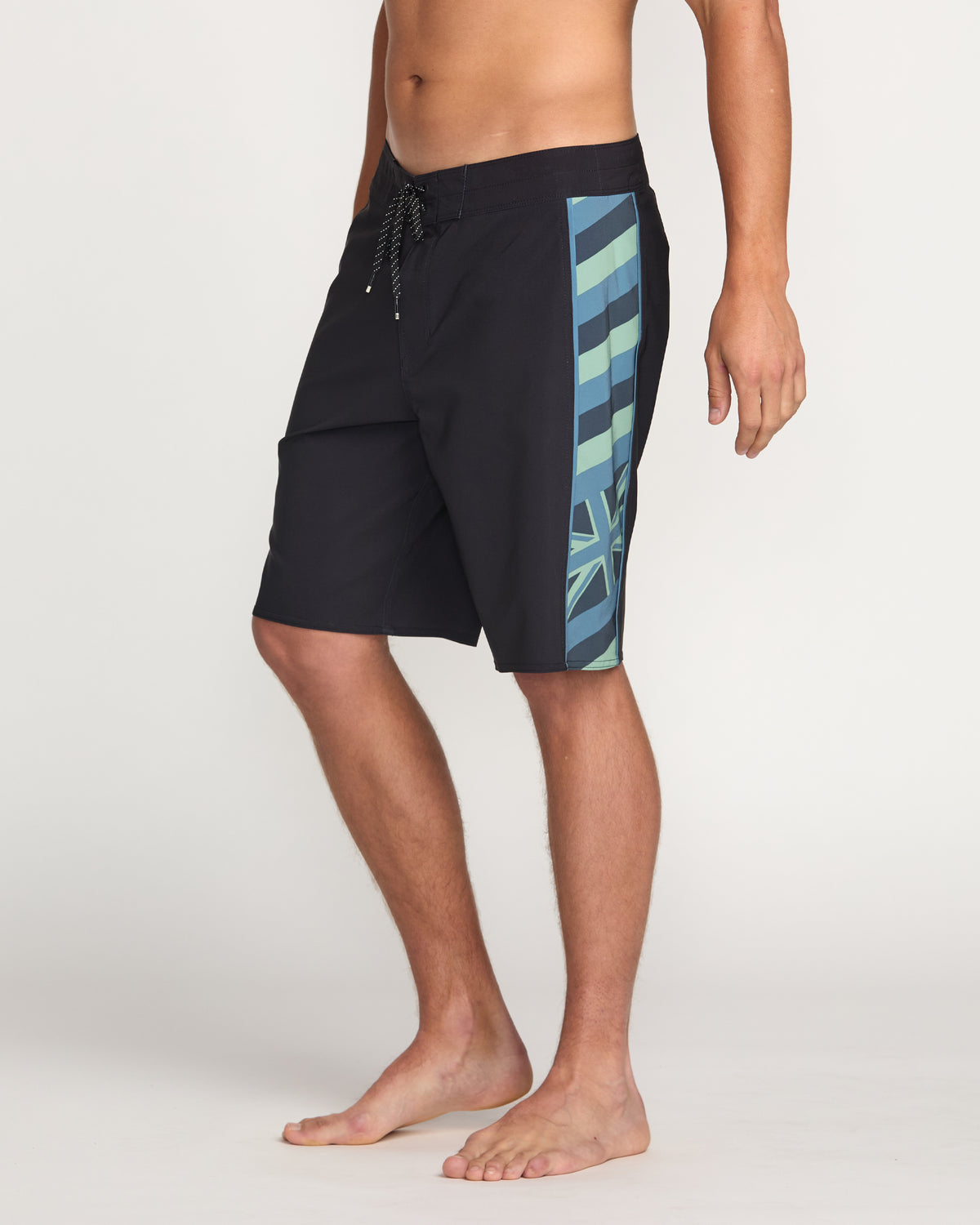 Black boardshorts with blue and green striped panel on side, drawstring waist, 19" inseam length.