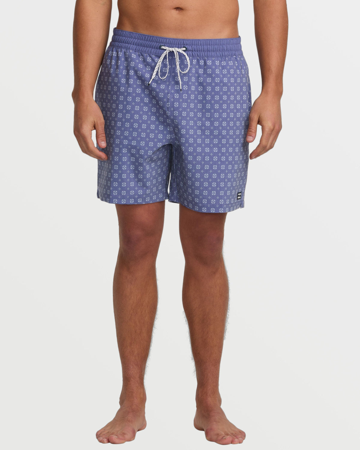 Deep blue swim trunks with white circular pattern and drawstring waistband.
