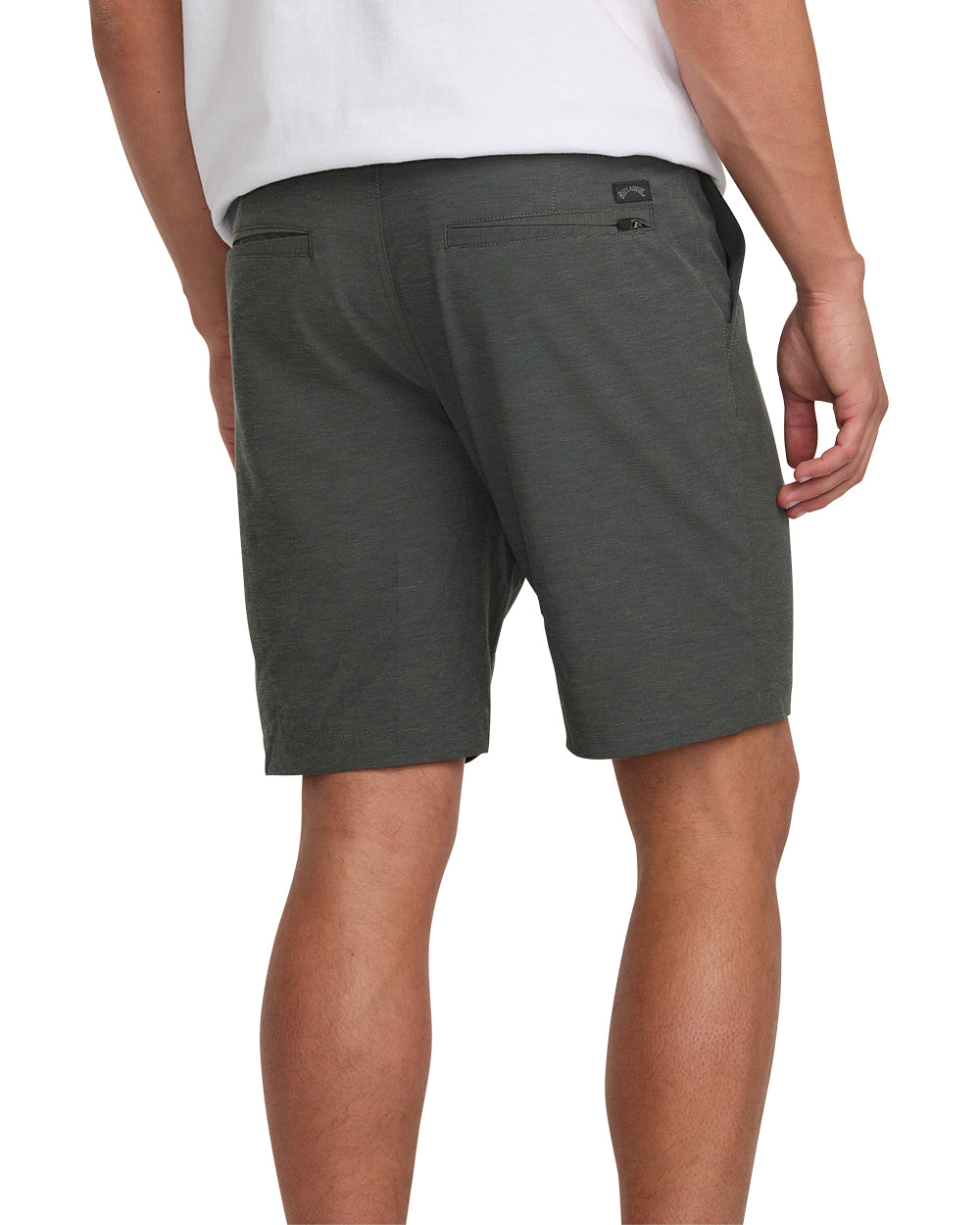 Asphalt gray hybrid shorts with button closure and back pockets, shown from rear view on male model.