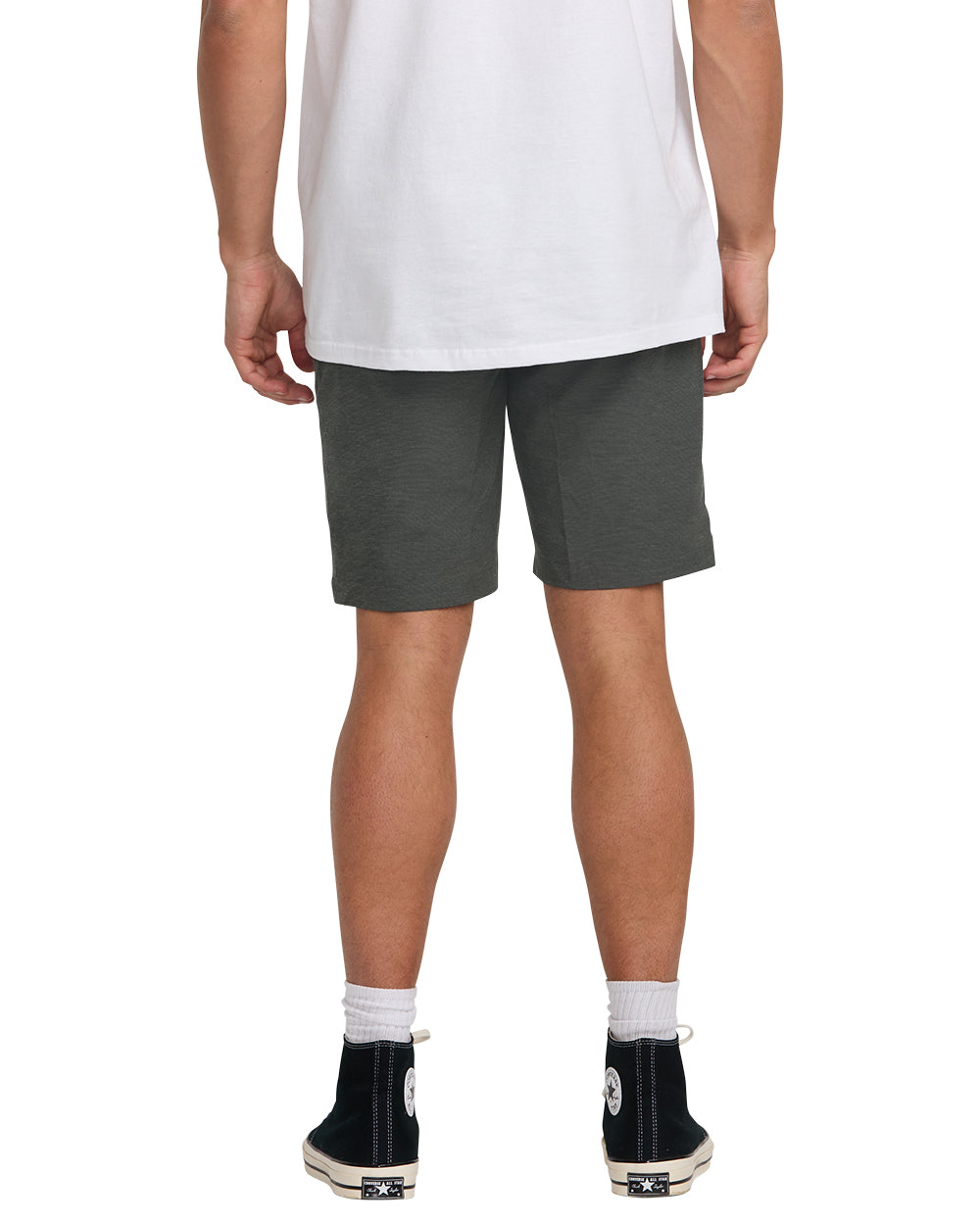 Man wearing white t-shirt and asphalt gray hybrid shorts with black high-top sneakers and white socks.