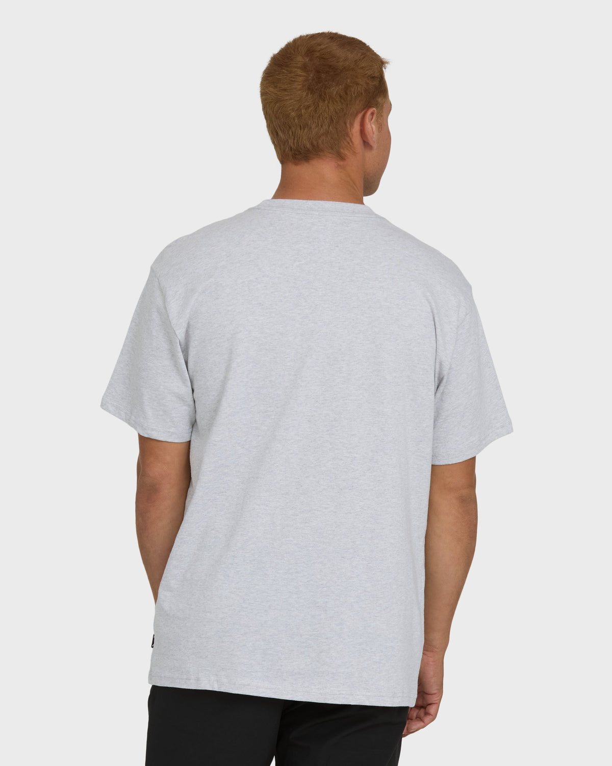 Heather gray short-sleeve t-shirt shown from back on male model wearing black pants.