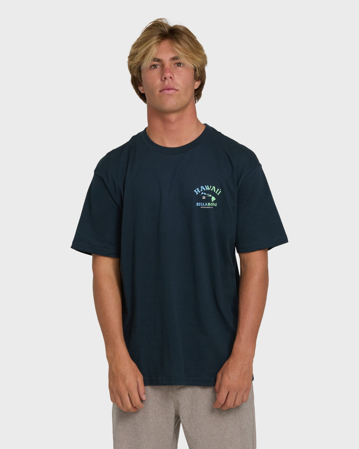 Navy short sleeve tee with small Hawaii Billabong graphic on chest.