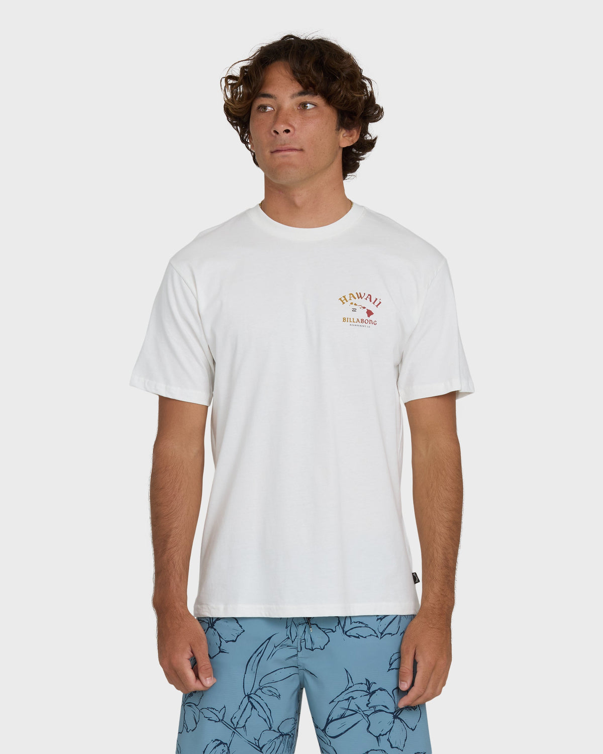 Off-white short-sleeve tee with small "Hawaii" and "Billabong" text graphic on chest.