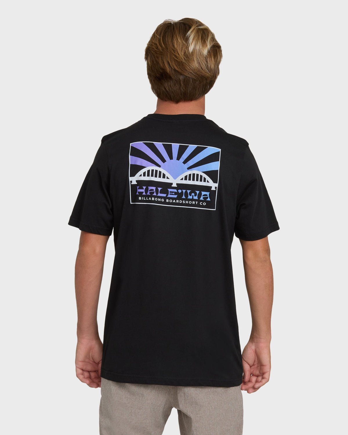 Black short sleeve t-shirt with back print featuring a bridge and rising sun design in purple and blue tones.