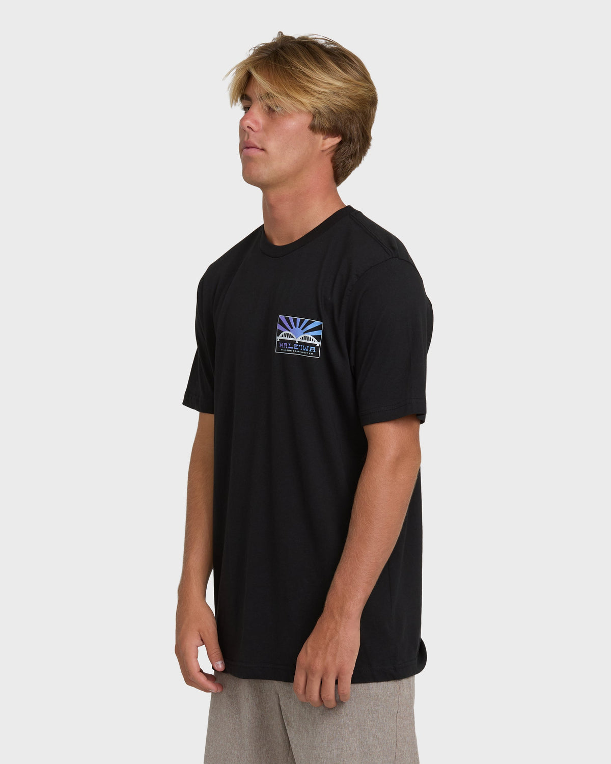 Black short sleeve t-shirt with small rising sun graphic on chest.