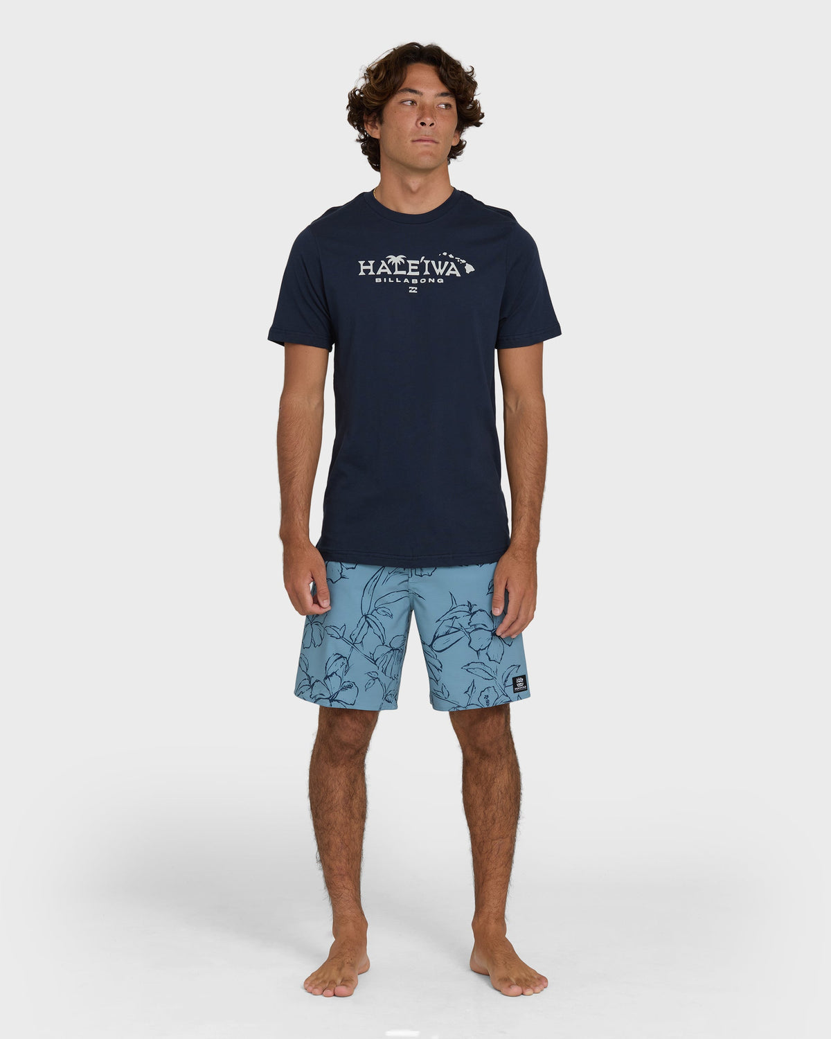 Navy short sleeve t-shirt with white "Haleiwa" text and palm graphic on chest.