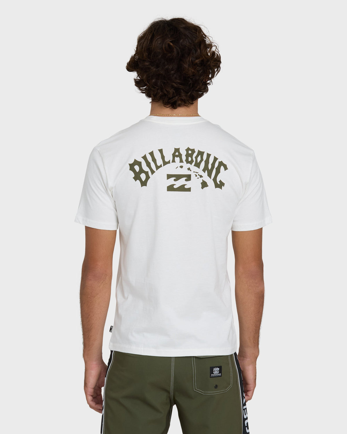 Off-white short sleeve t-shirt with olive-colored "Billabong" arch graphic and logo on back.