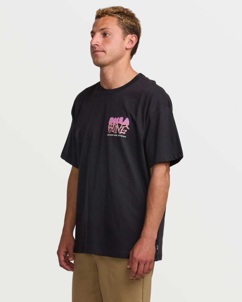 Black short sleeve t-shirt with pink graphic print on chest, worn by male model with khaki pants.