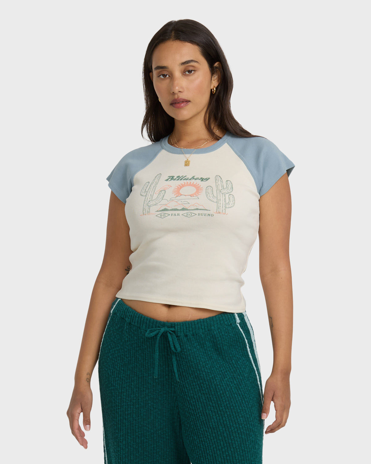 Mineral blue and cream raglan tee with short sleeves and desert graphic print on front.