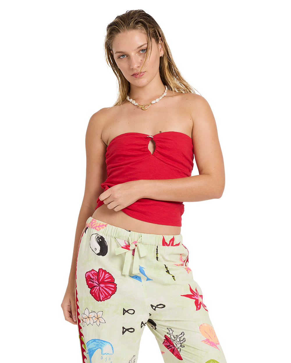 Red strapless tube top with keyhole cutout at center chest.