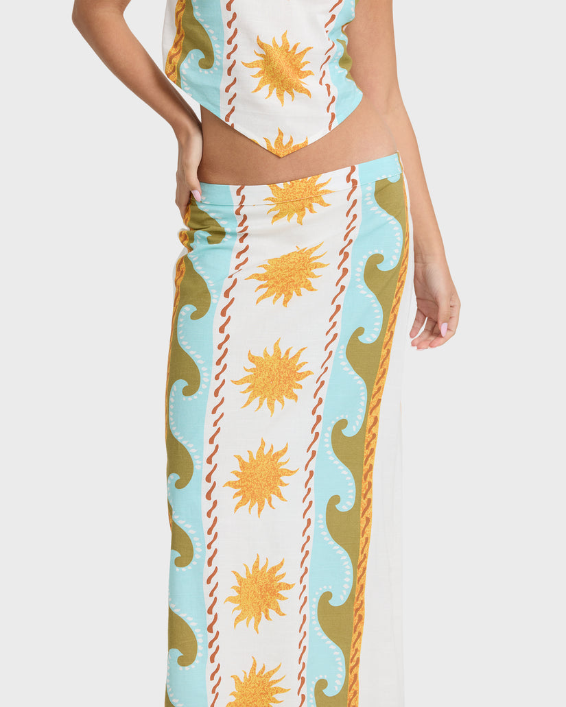 Midi skirt with sun and wave print in cream, light blue, gold, and red stripes.