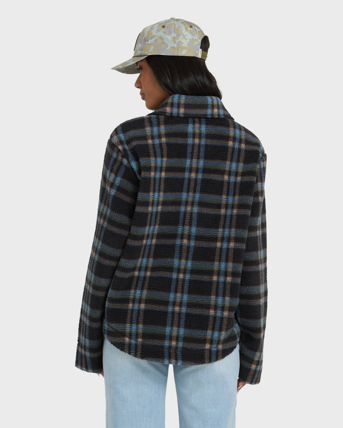 Black and blue plaid sherpa shacket with collar, shown from back view on model wearing light blue jeans.