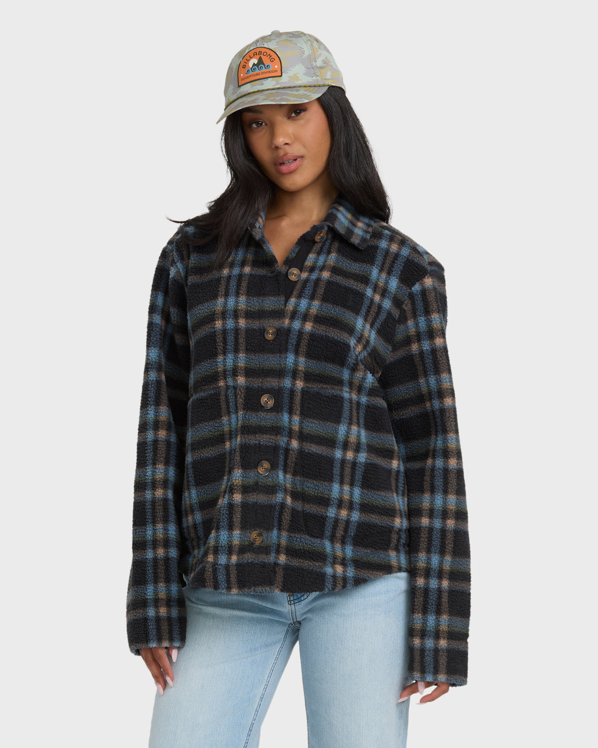 Black and blue plaid sherpa shacket with button front and long sleeves.