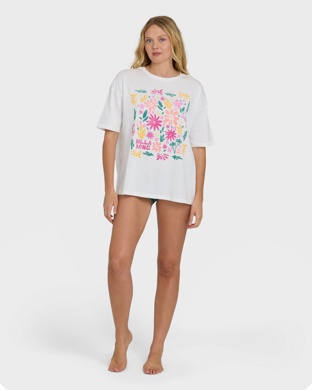 White short-sleeve t-shirt with colorful floral print and text graphic on front chest area.