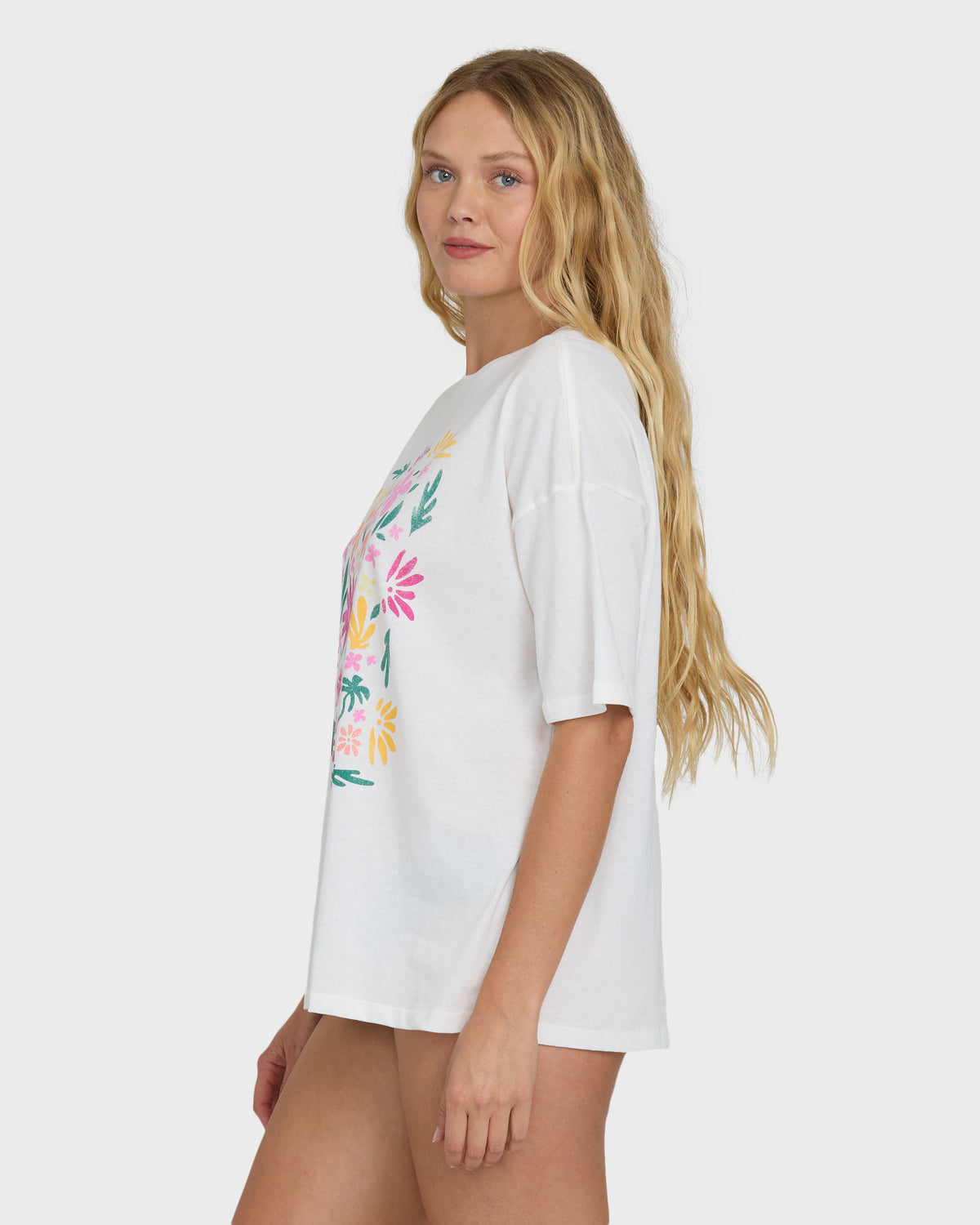 Salt crystal short-sleeve t-shirt with multicolored floral graphic print on front.