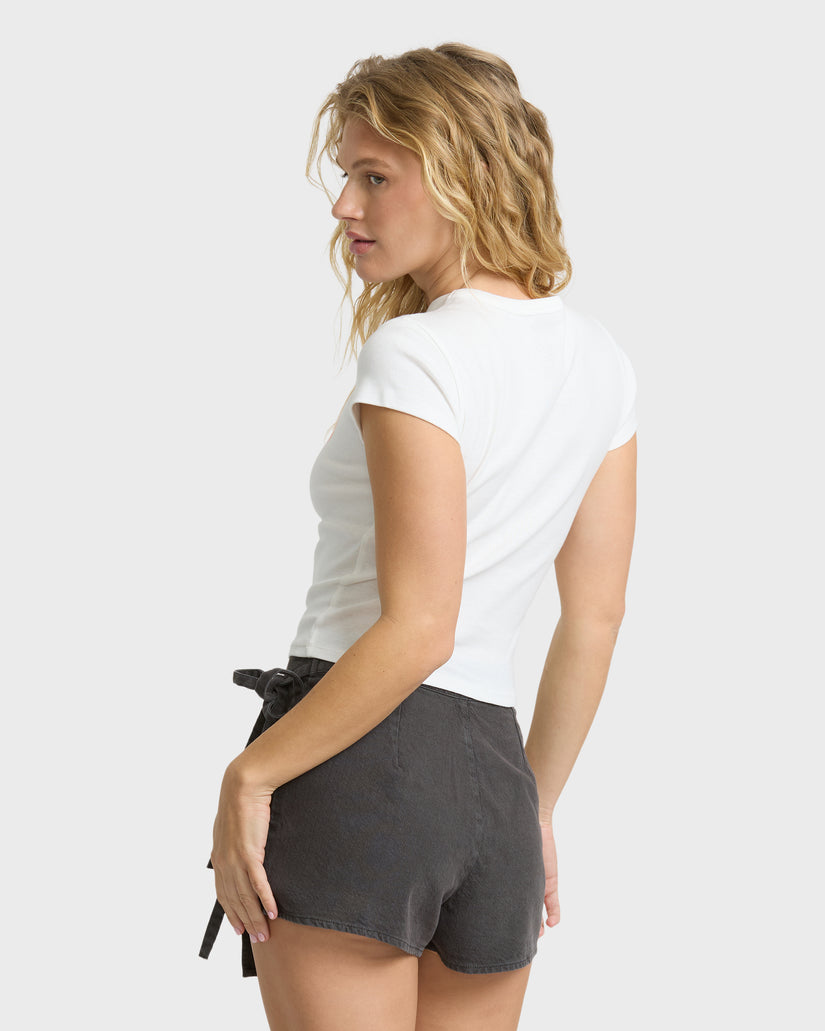 White short-sleeve t-shirt with crew neckline worn by model shown from back view.