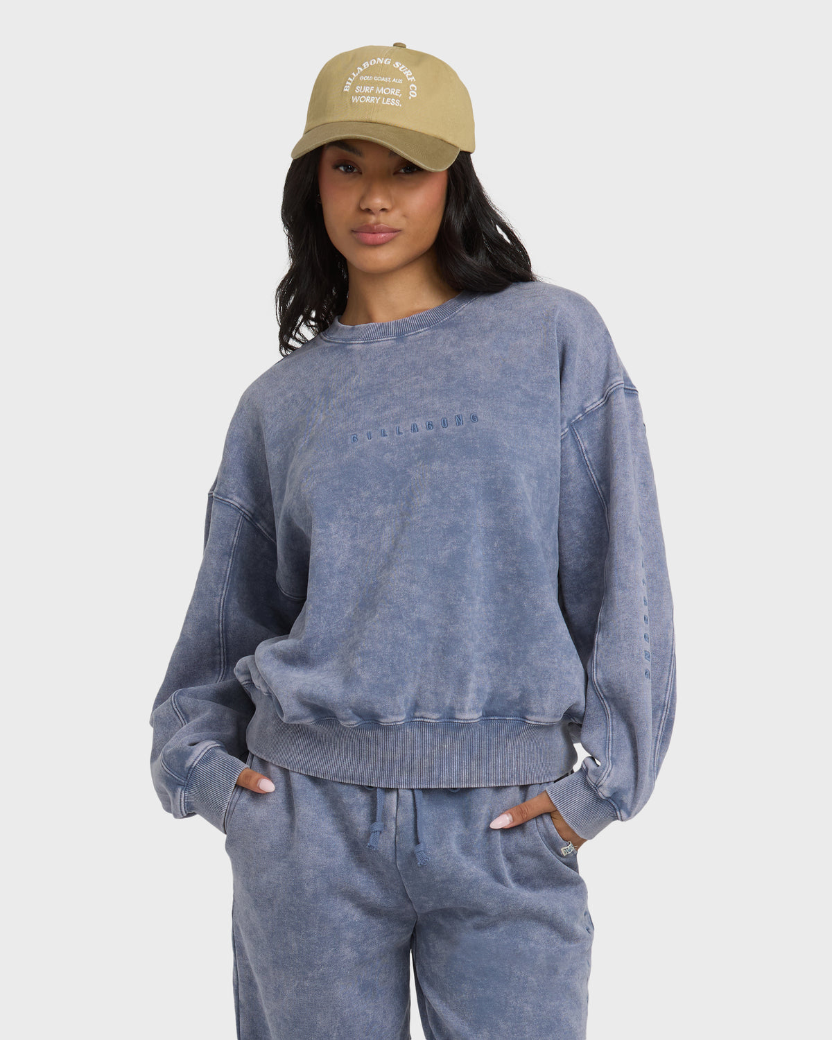 Stone blue saltwashed crewneck sweatshirt with embroidered text and ribbed cuffs and hem.