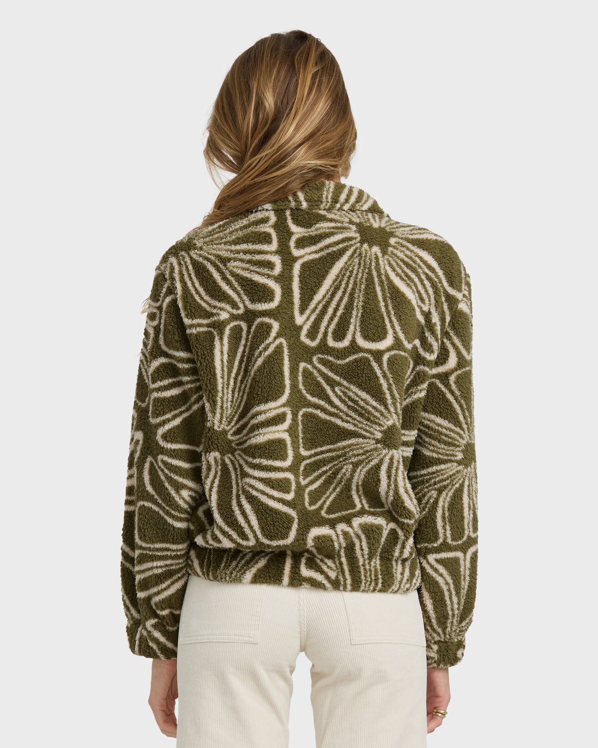 Martini olive sherpa fleece with cream geometric pattern, front zip closure, shown from back on model.