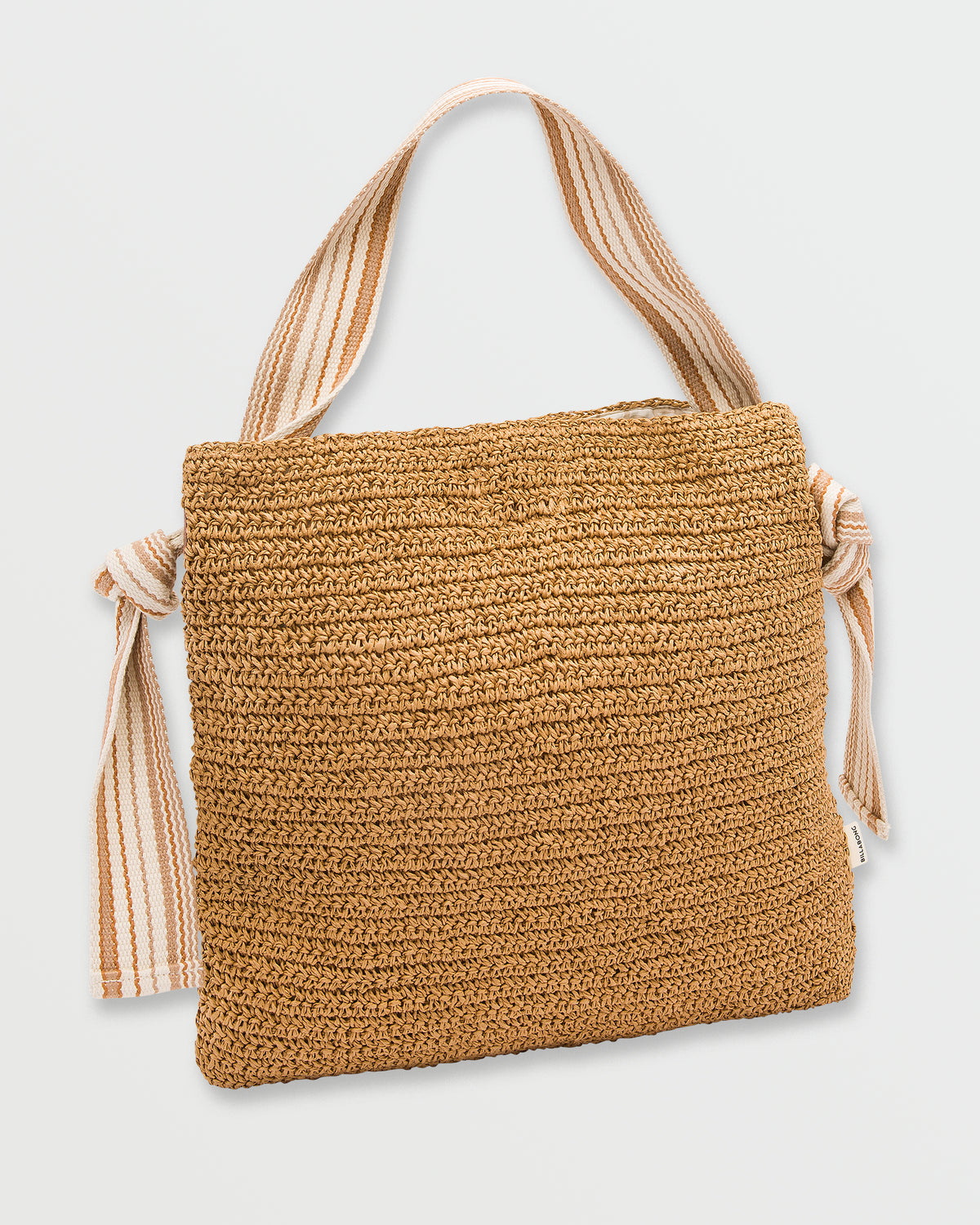 Tan woven straw shoulder bag with striped fabric handles and knotted side ties.