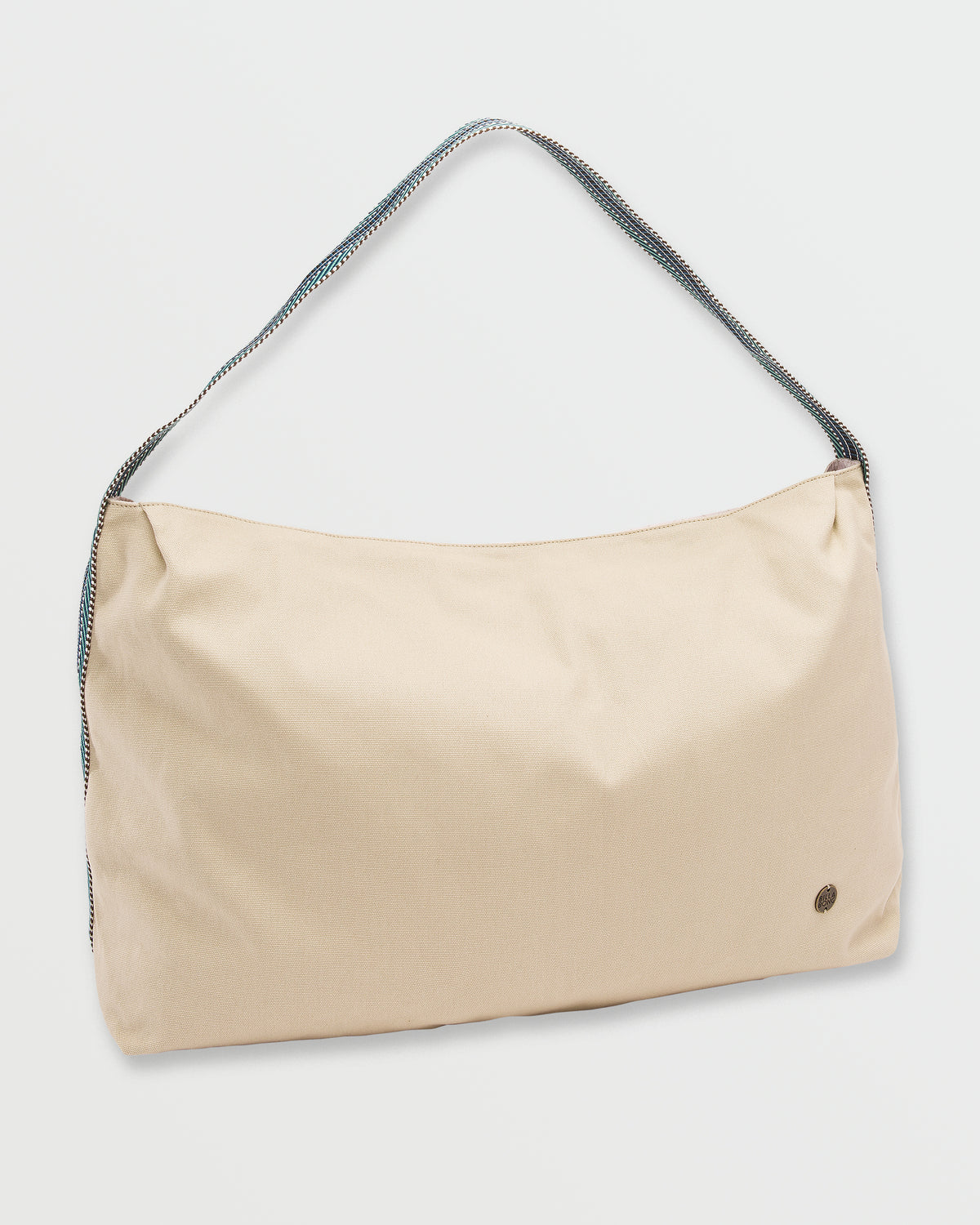 Cream-colored shoulder bag with braided gray and blue strap and small circular logo on front.