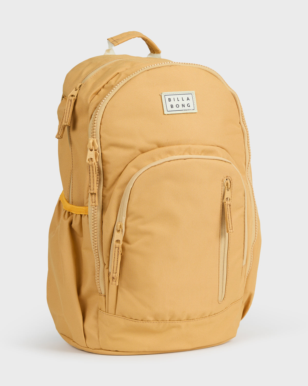 Honey-colored backpack with padded straps, front zippered pocket, and Billabong brand label.