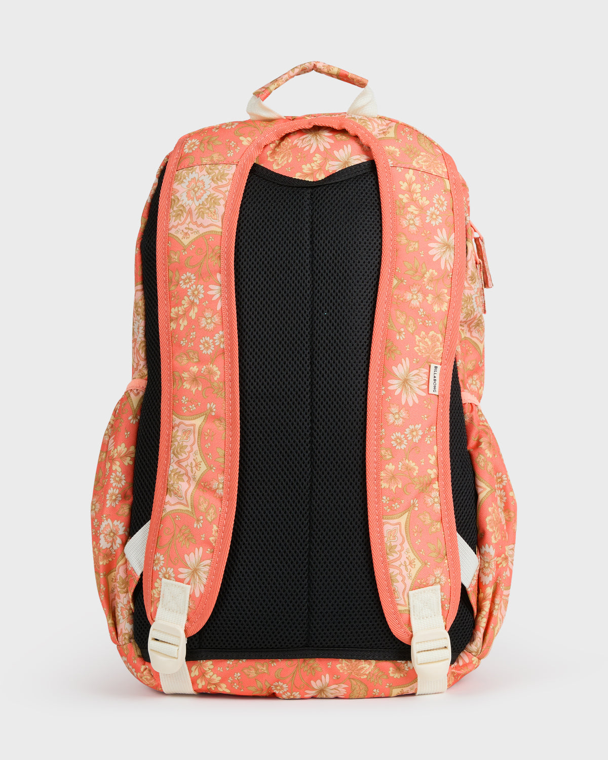 Coral backpack with yellow floral pattern, black mesh back panel, and cream-colored straps and handles.