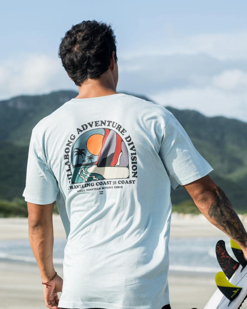 White short sleeve t-shirt with back graphic featuring sailboat, palm trees, and "Billabong Adventure Division" text.