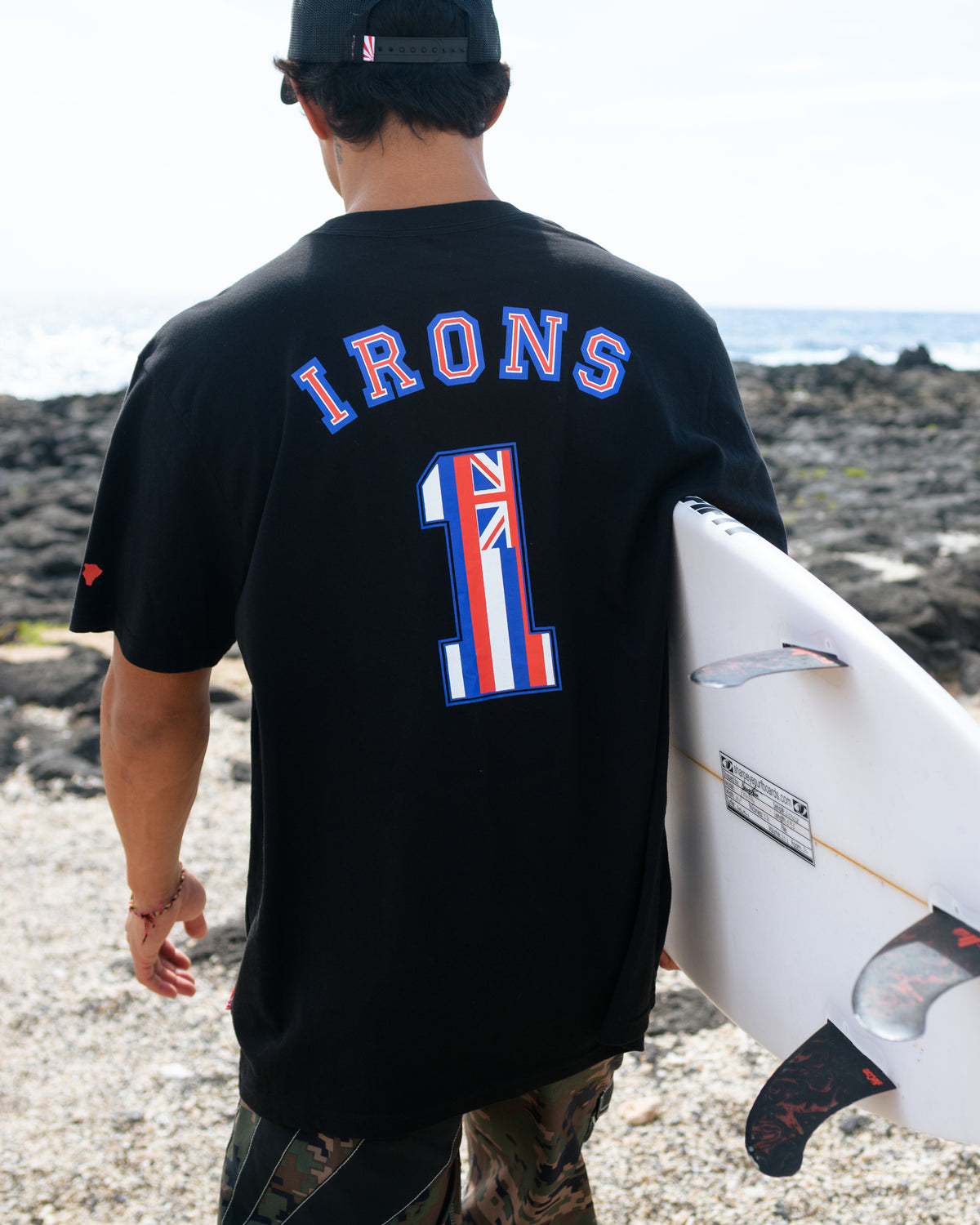 Black short sleeve t-shirt with blue and red "IRONS 1" graphic and Union Jack design on back.