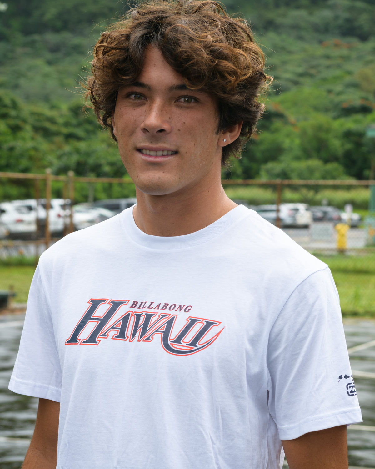 White short sleeve t-shirt with "Billabong Hawaii" text and logo printed on chest.