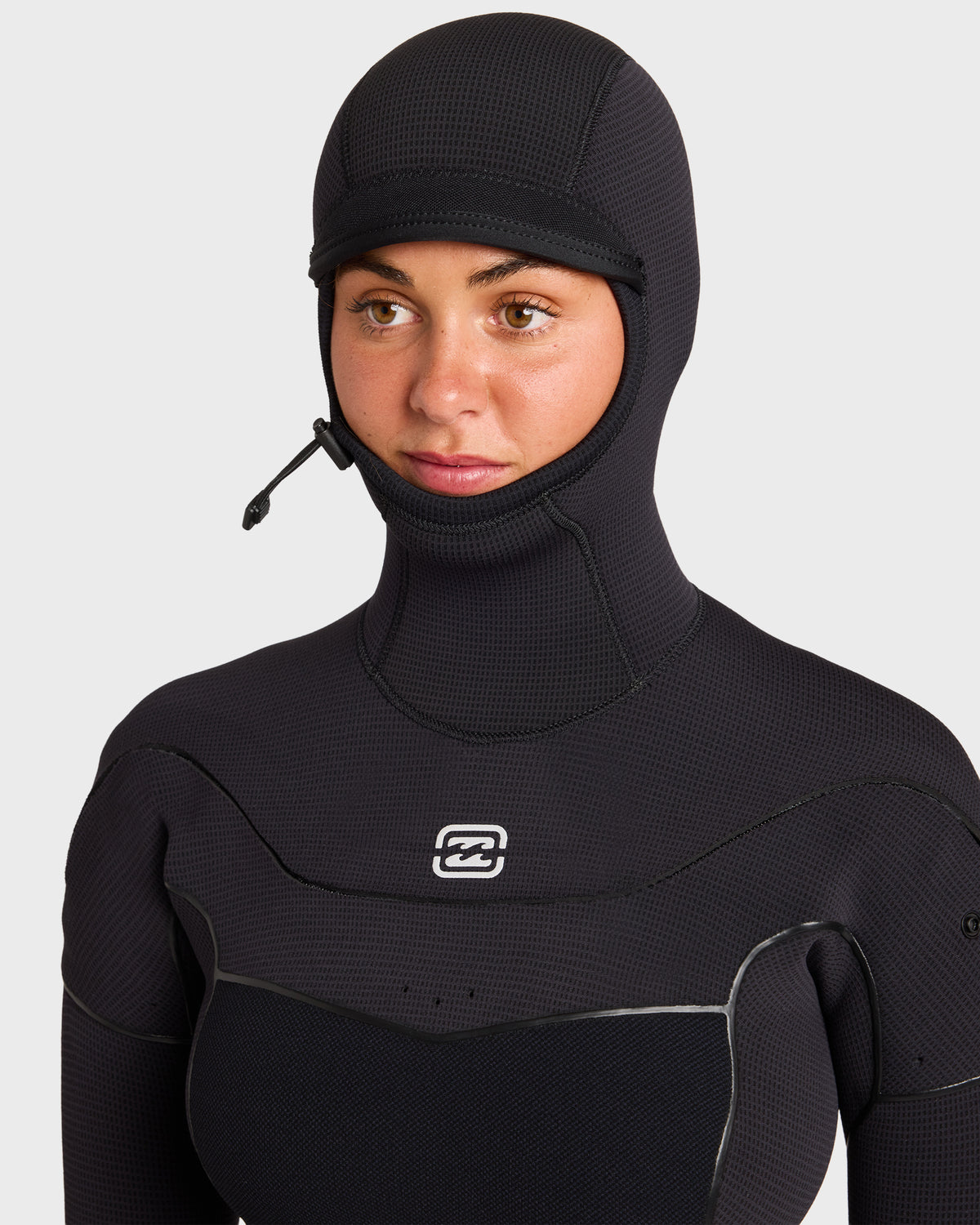 Black full wetsuit with attached hood, chest zip closure, and brand logo on chest.