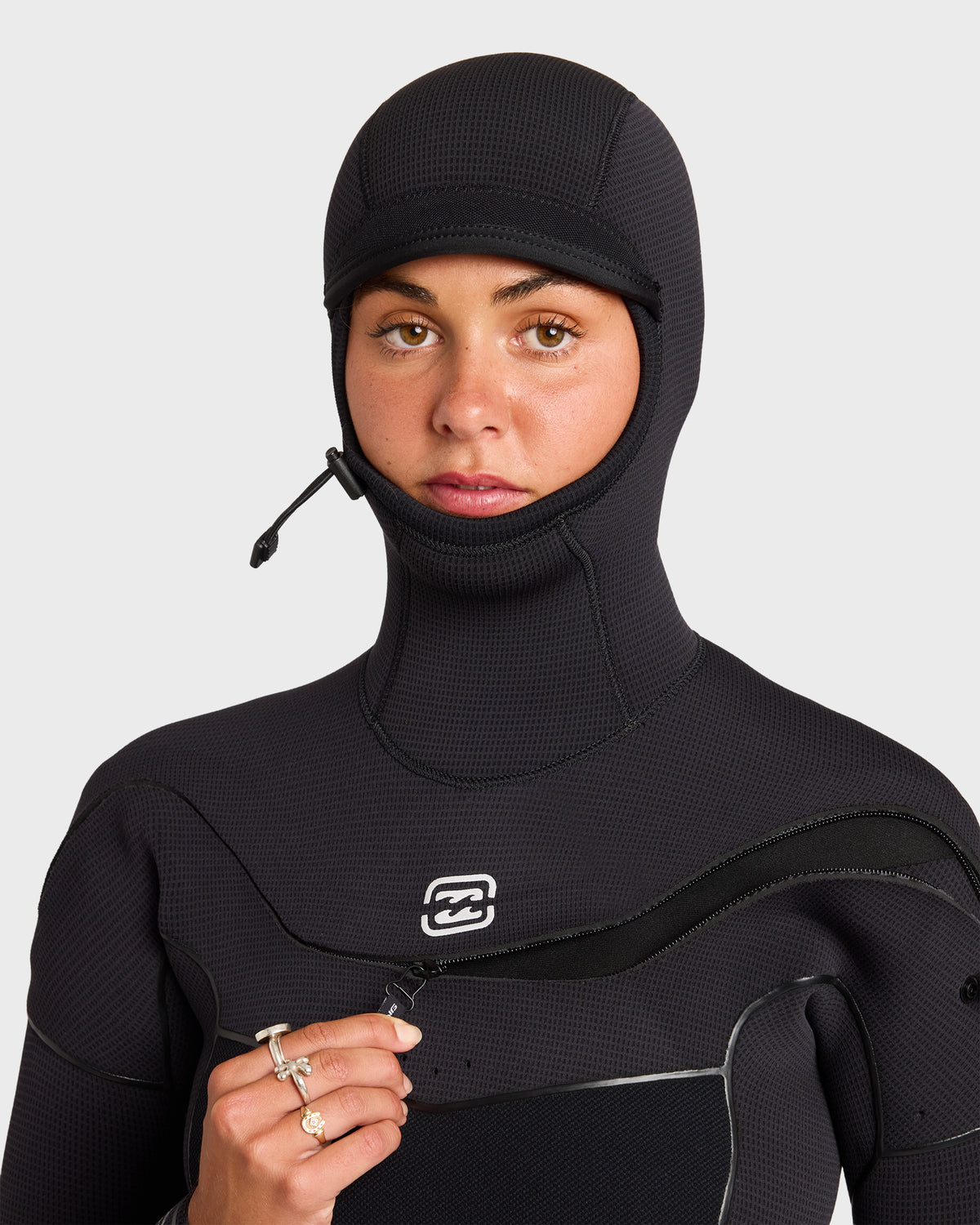 Black hooded full wetsuit with chest zip closure and textured neoprene material.