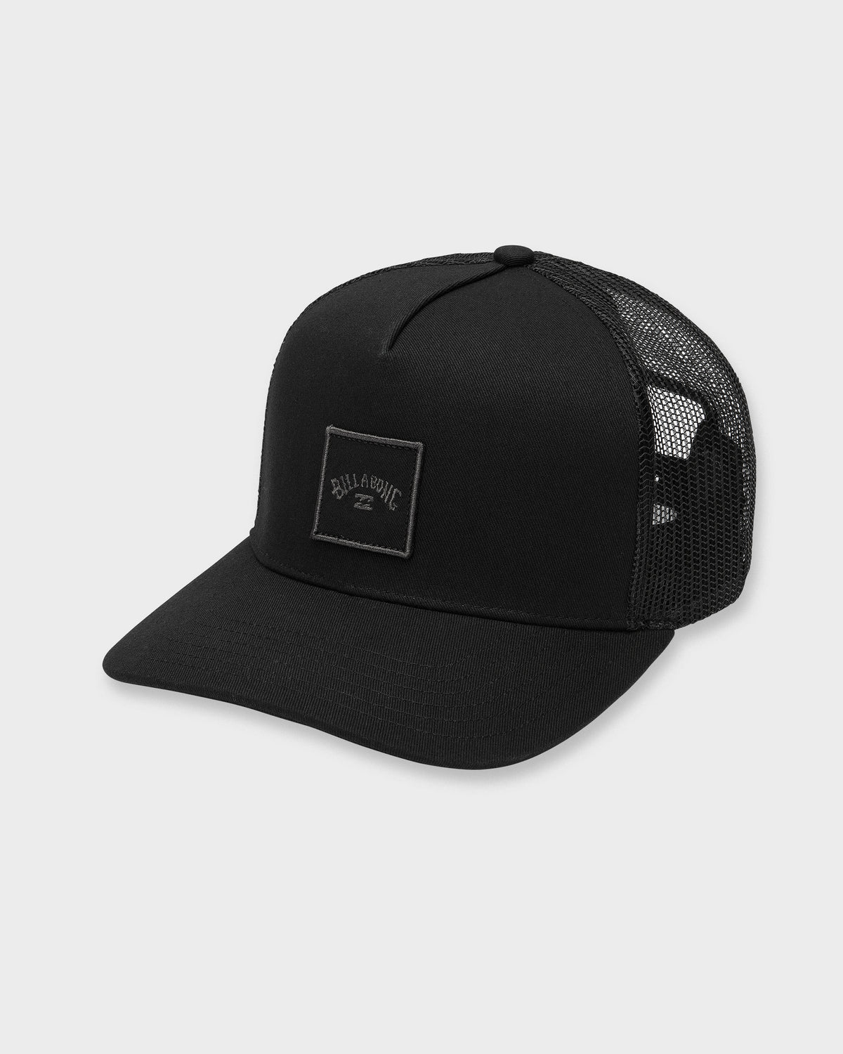 Black trucker hat with mesh back panels and rectangular logo patch on front.