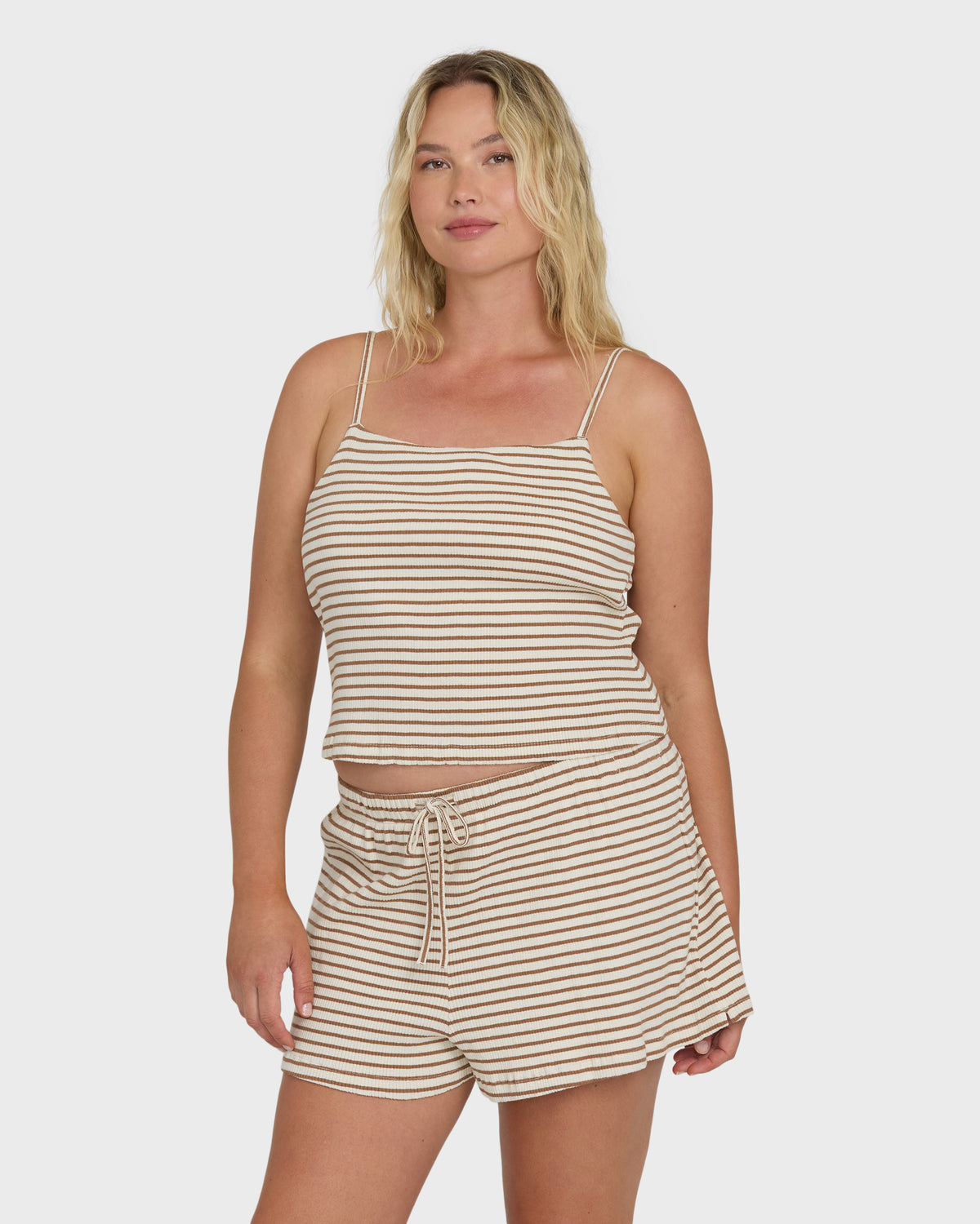 Brown and cream striped knit shorts with drawstring waist, shown as part of a matching set.