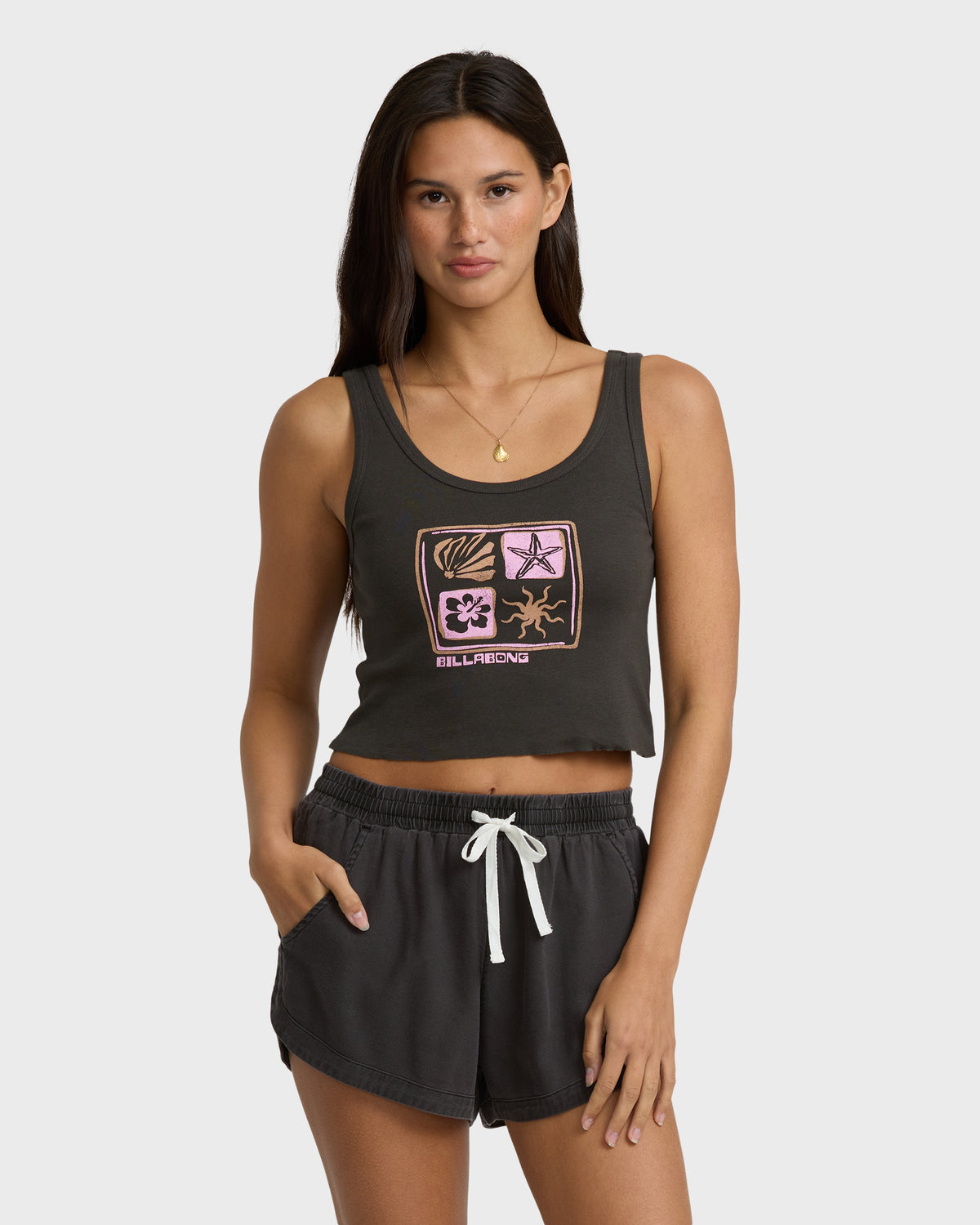 Off-black sleeveless tank top with four-panel graphic design featuring shell, starfish, flower, and sun motifs with "Billabon