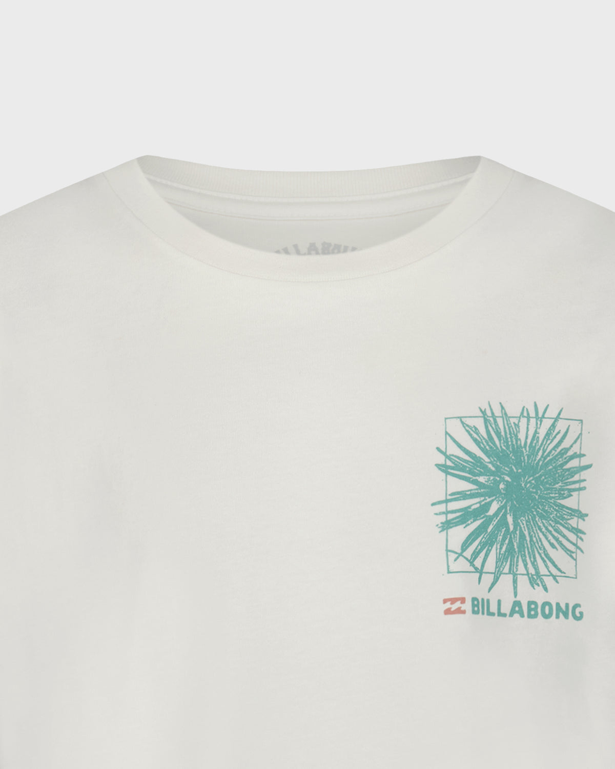 White t-shirt with green graphic design and Billabong logo on a white background