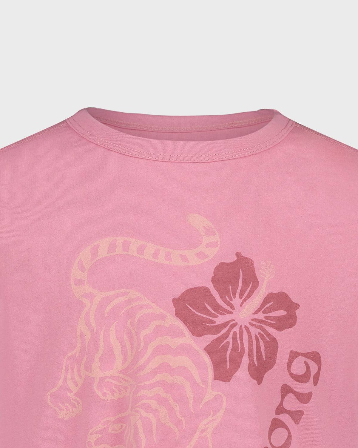 Pink t-shirt with a tiger and floral design on a light gray background