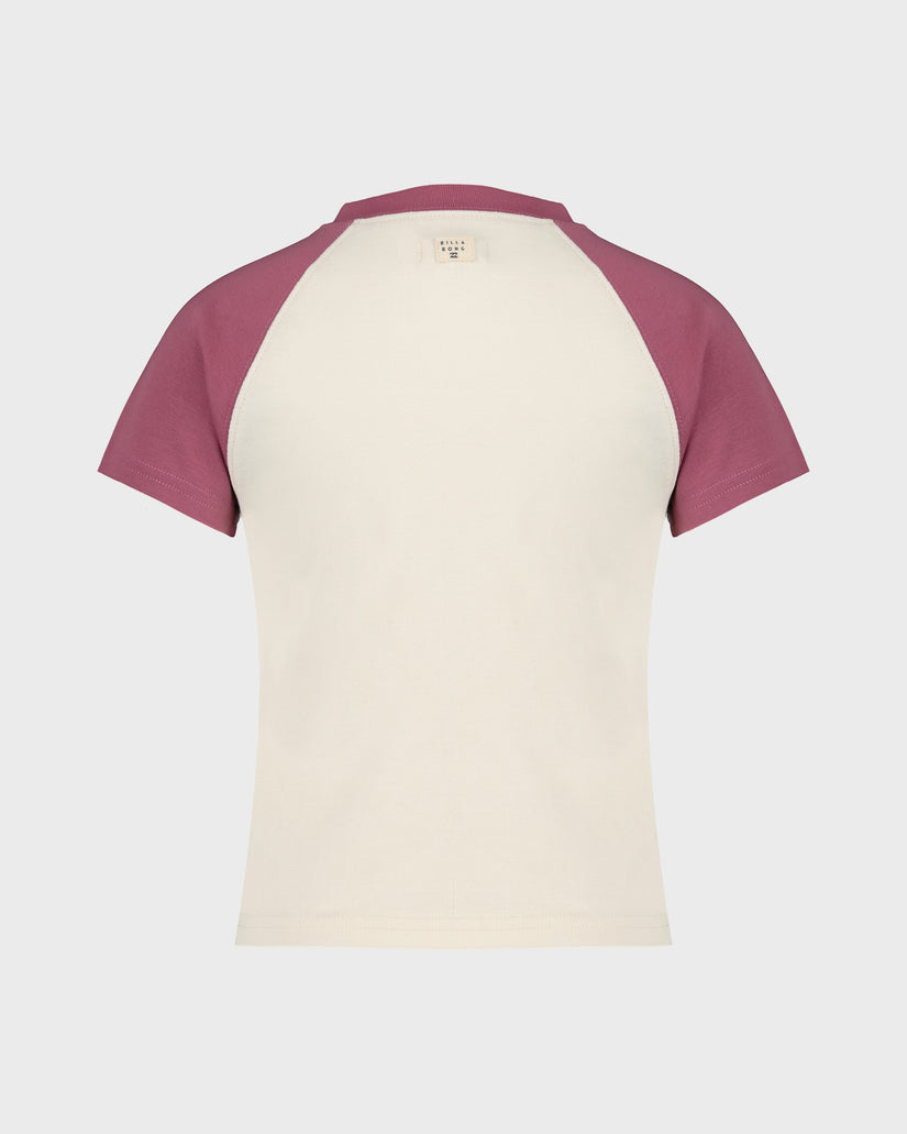 Two-tone t-shirt with maroon sleeves and cream body on a light gray background