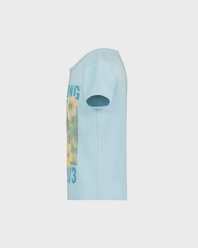 Light blue t-shirt with floral design and text on a white background