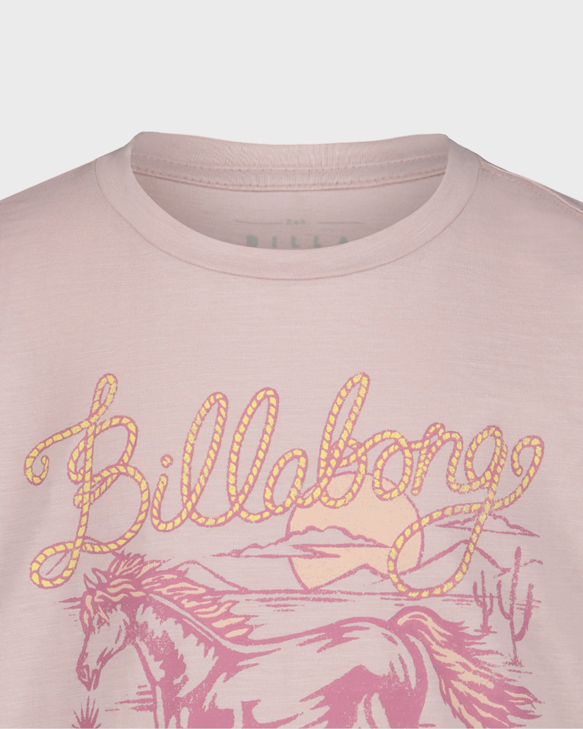 Pink t-shirt with 'Billabong' logo and horse design on a light gray background