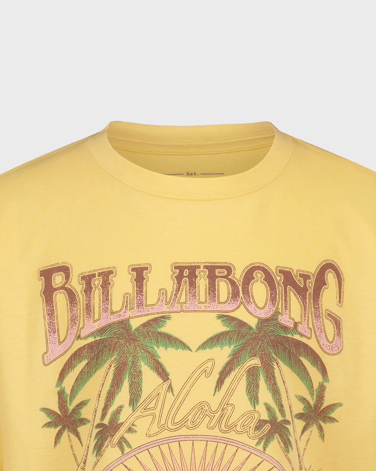 Yellow t-shirt with Billabong and Aloha graphics on a light gray background