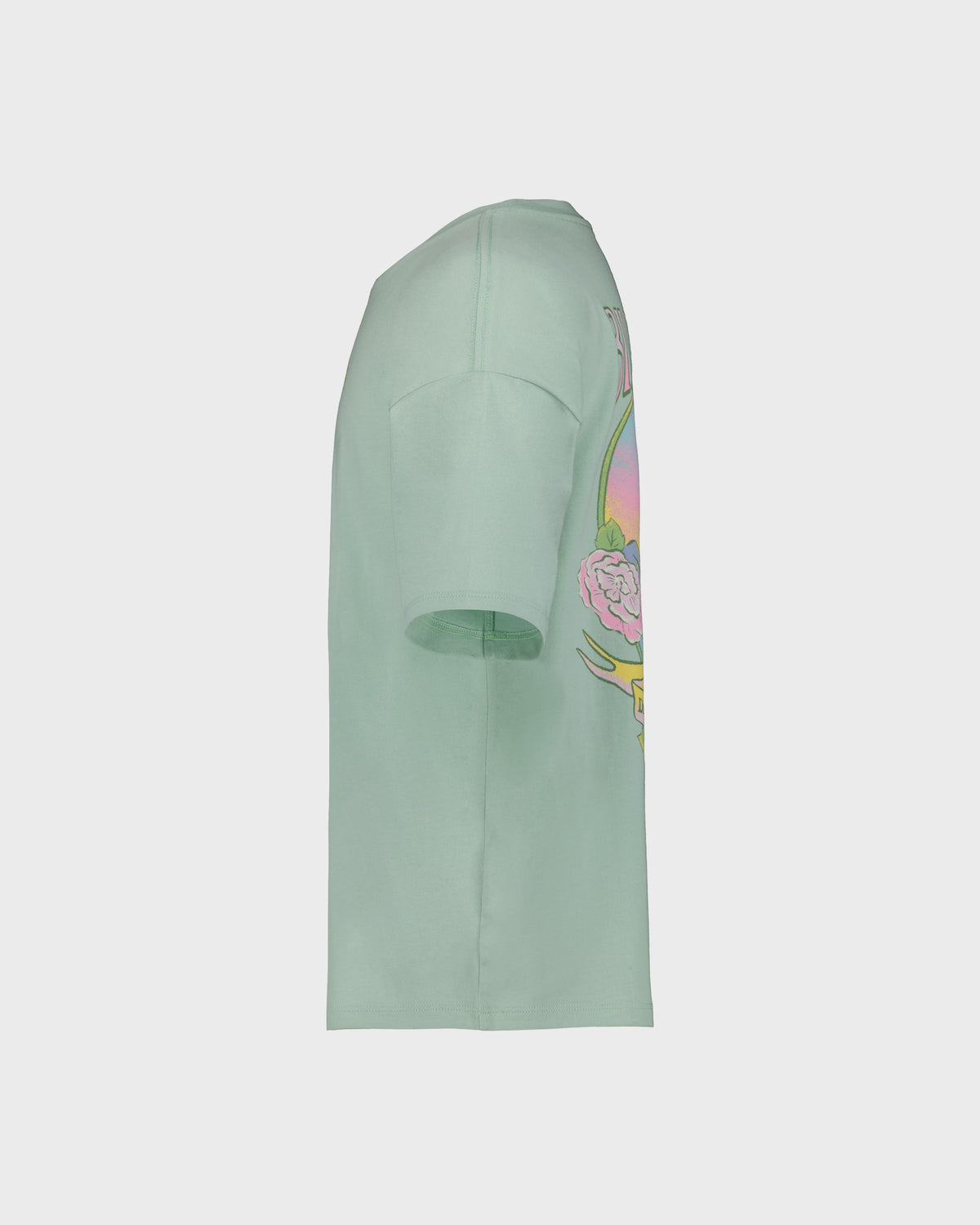 Green skirt with floral design on a light gray background