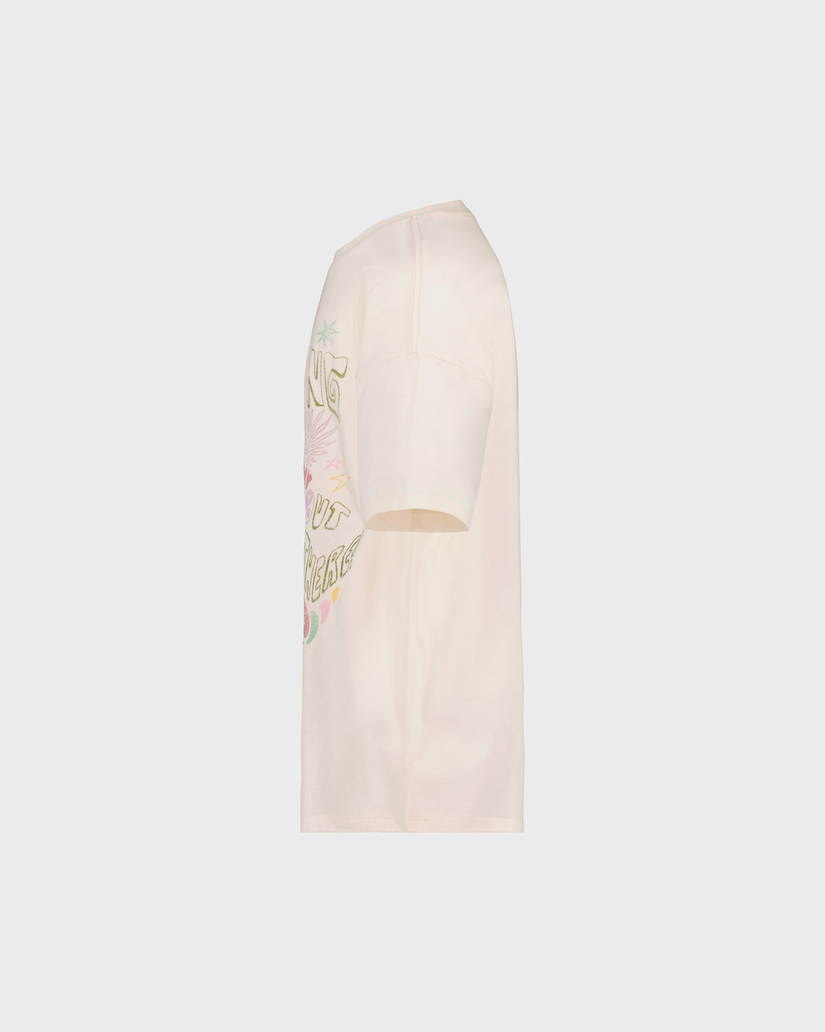 Beige t-shirt with floral design and text on a light gray background