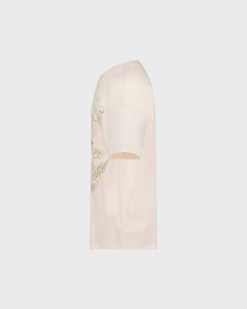 Beige t-shirt with floral design and text on a light gray background