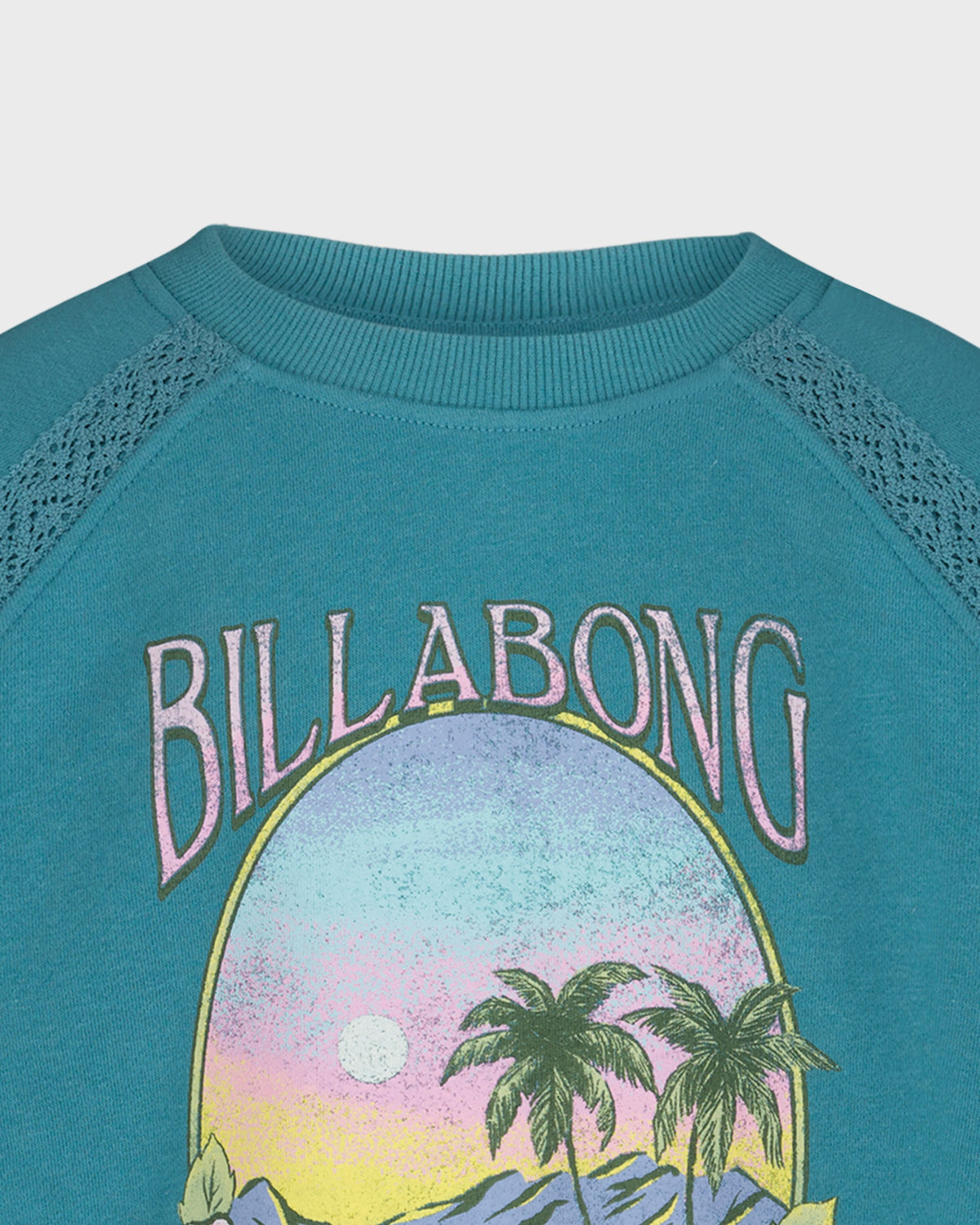 Teal sweatshirt with Billabong logo and palm tree design on a white background