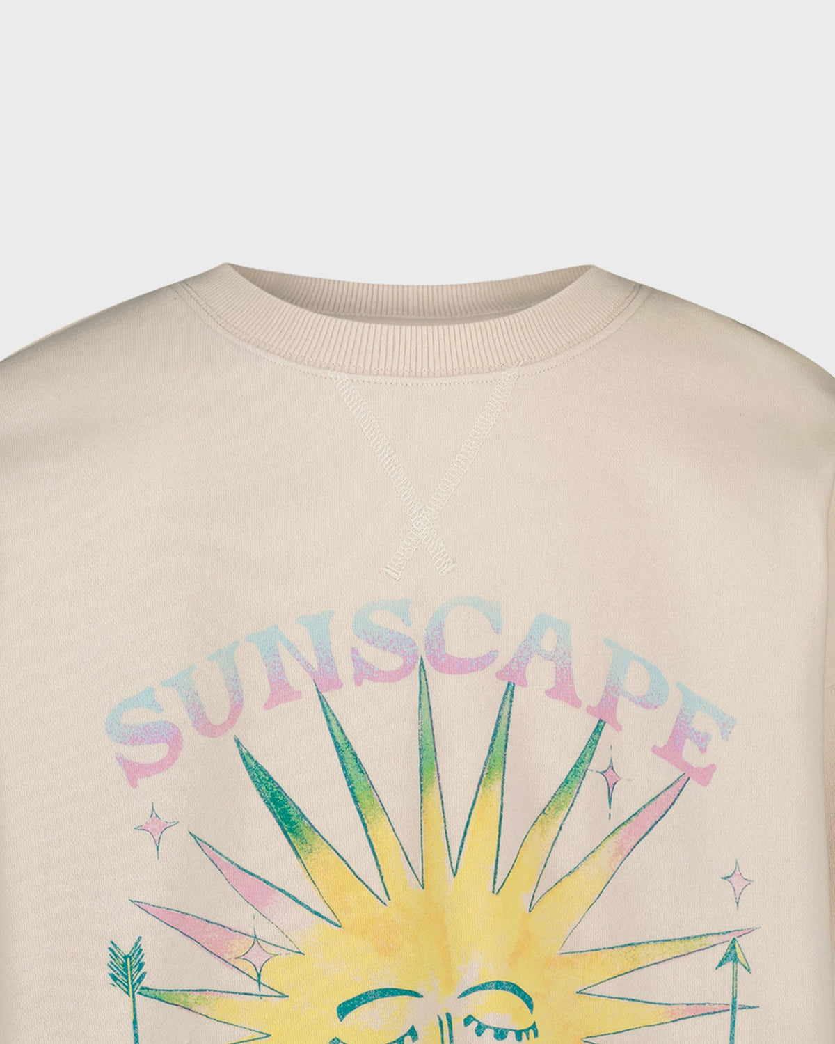 Beige sweatshirt with a colorful sun graphic and 'SUNSCAPE' text on a light gray background