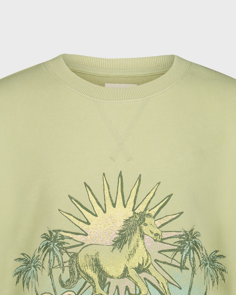 Light green sweatshirt with a unicorn and palm tree design on a white background
